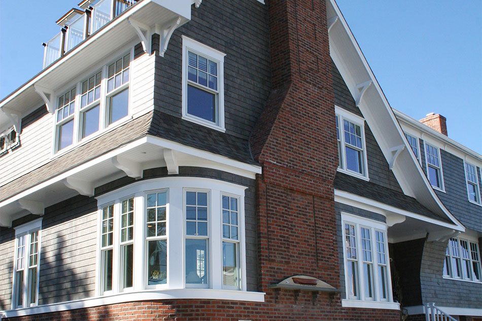 A two-color mix of Arborcoat stain giving the appearance of a solid stain proved to be just the right color and look for the exterior of the house.